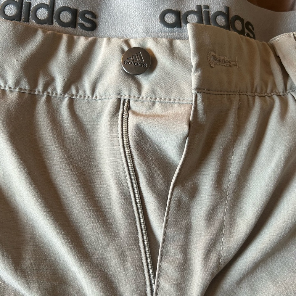 Adidas tan golf men’s shorts size 32. 88% polyester. 12% spandex.